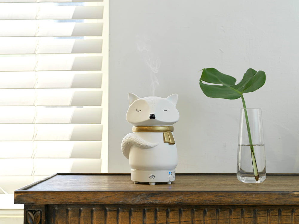 Snow Fox diffuser ultrasonic mist disperses a gentle aroma.