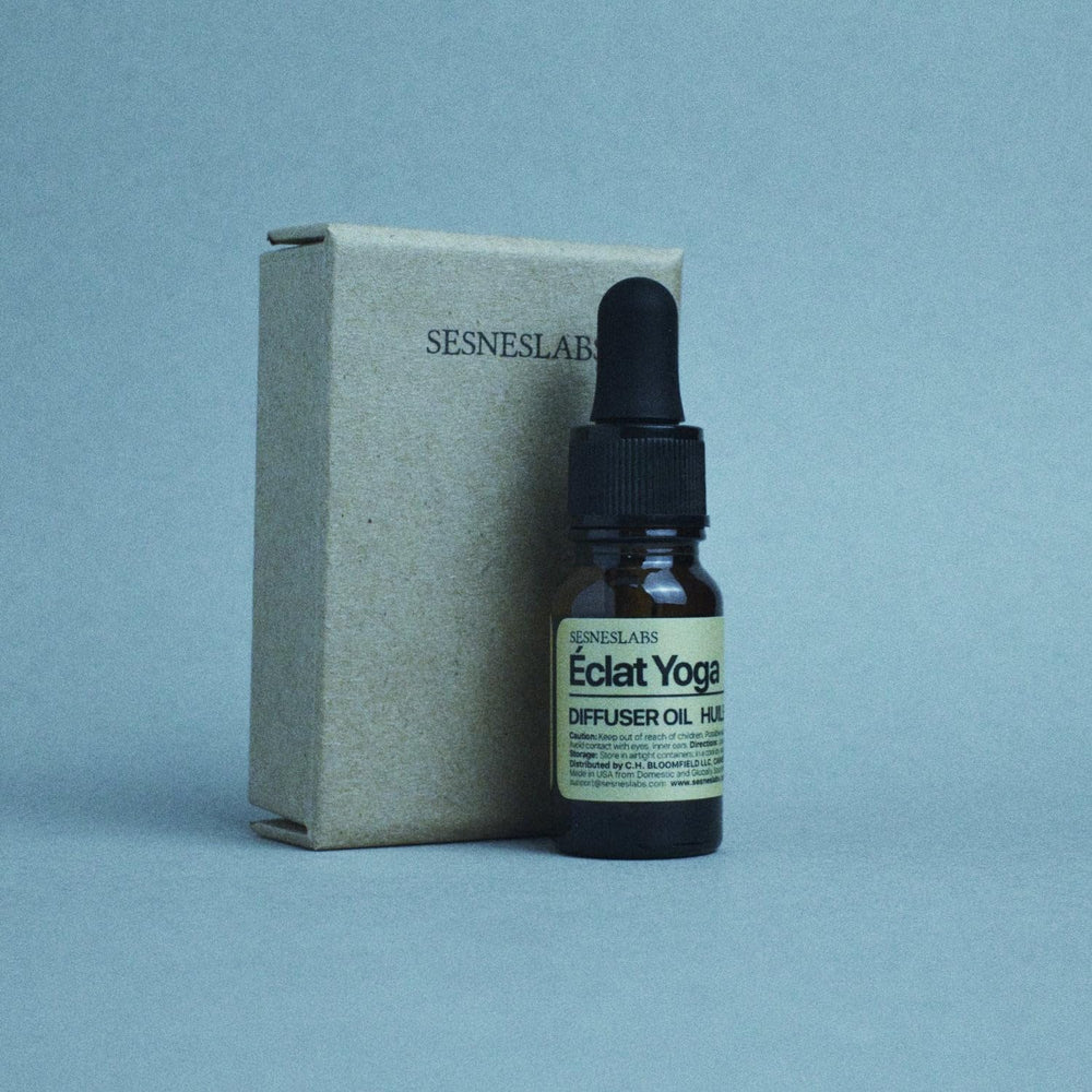 sesneslabs Éclat Yoga Diffuser Oil ambient fills room with citrus-floral mood.