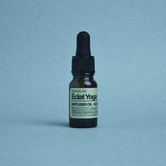 sesneslabs Éclat Yoga Diffuser Oil setup creates a tranquil yoga space.