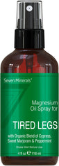 Close-up of Seven Minerals bottle label highlighting essential oil blend for leg comfort.