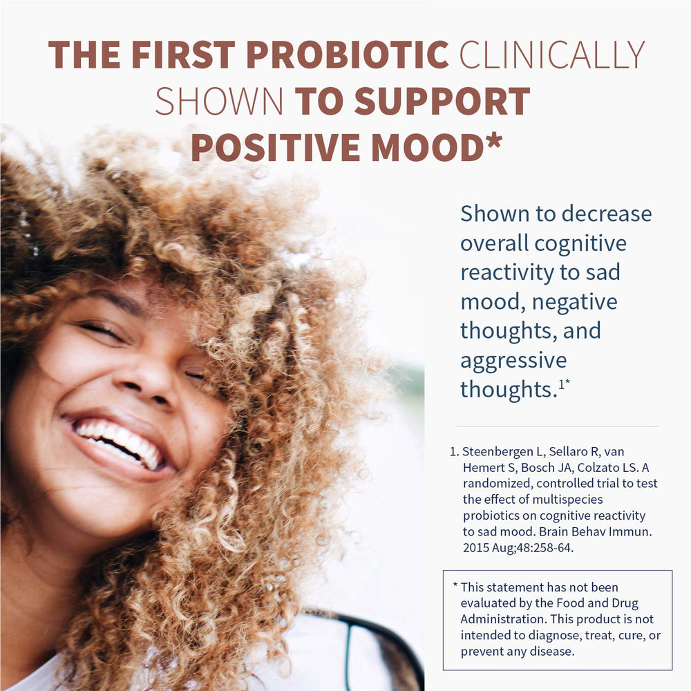 Close-up of Klaire Labs probiotic sachet showing a 9-strain blend for gut-brain support.