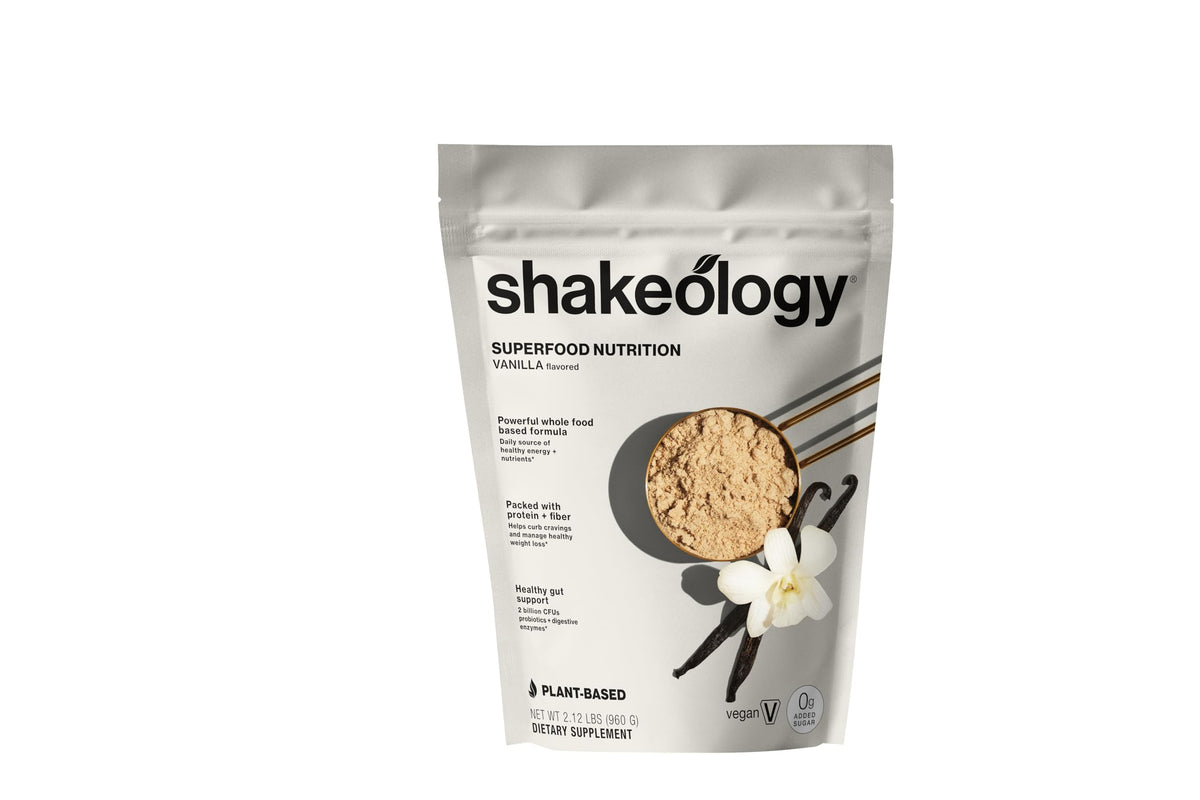 Shakeology vanilla bottle pour highlights convenient plant-based protein for busy days.