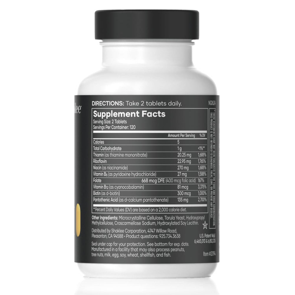Shaklee B-Complex tablets close-up shows easy-to-take capsules for daily wellness.