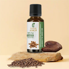 Dropper close-up of Sheer Essence Ambrette Seed Oil ready for diffusion.