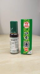 Shen Nong Si Four Season medicated oil roll-on bottle for easy on-the-go relief.