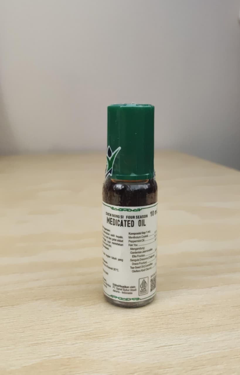 Travel-friendly roll-on bottle from Shen Nong Si Four Season for on-the-go care.