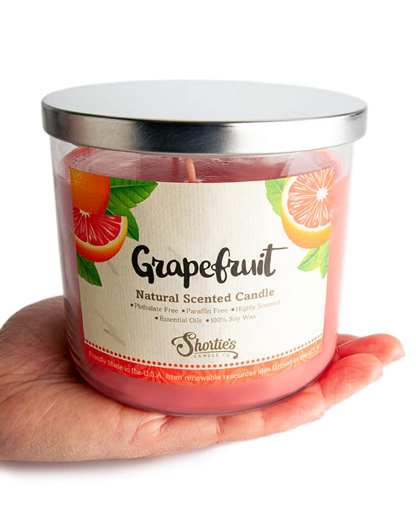 Shortie's Grapefruit 3-Wick Candle packaging close-up highlighting US-made essential oils.