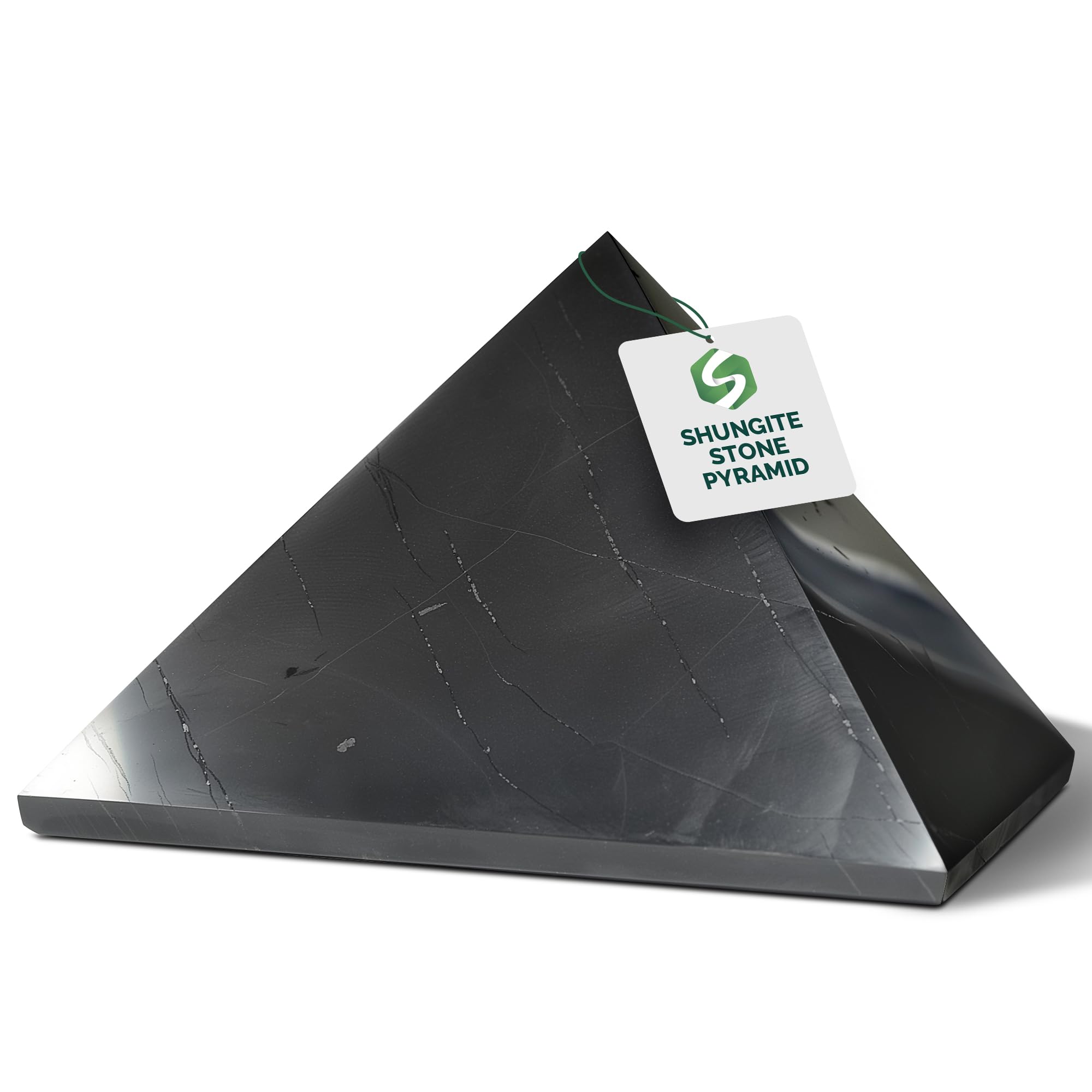 Shungite World authentic pyramid closeup, polished surface, potential energy balancing near devices.
