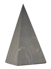 Shungite World authentic tall pyramid 70mm on desk promotes energy balance.