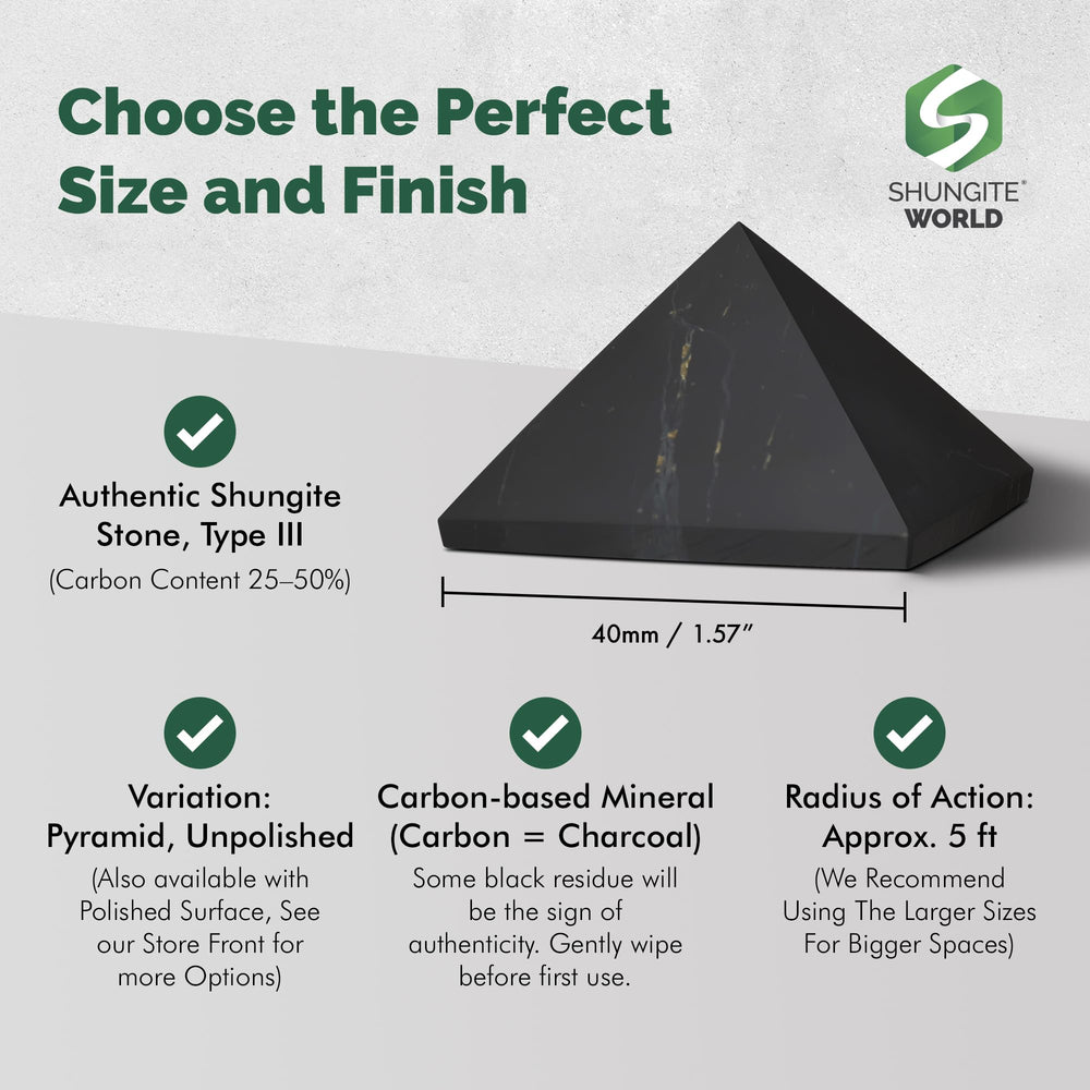 Shungite World pyramid near electronics promotes calm energy around devices.