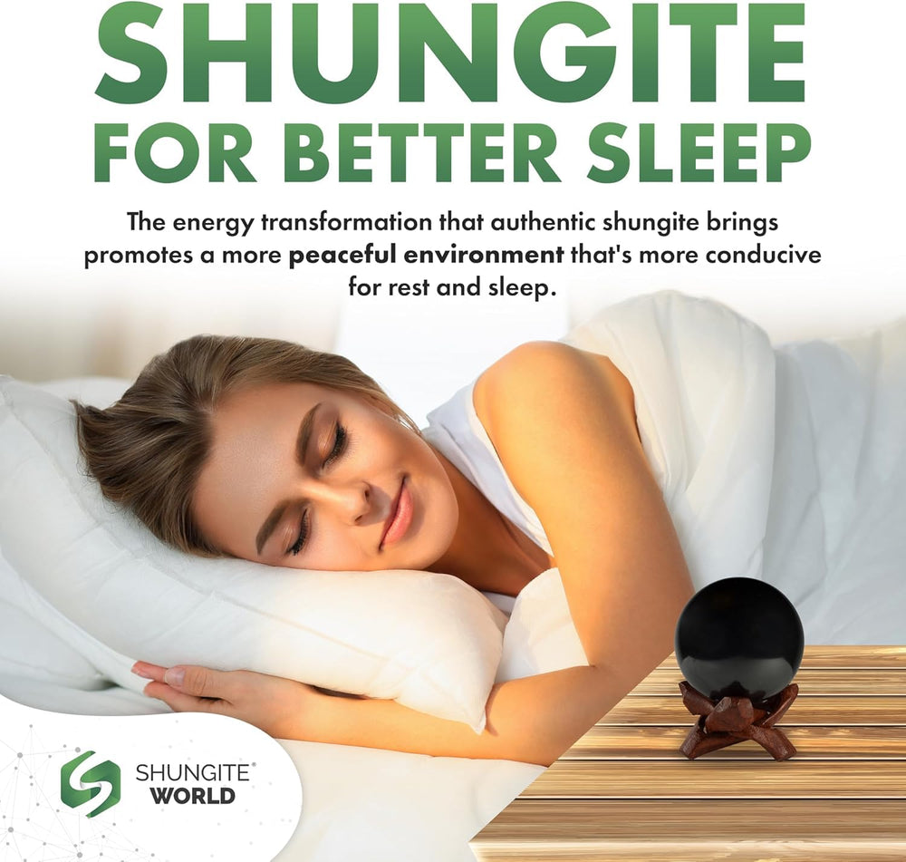 Shungite World sphere near electronics balances surrounding energy.