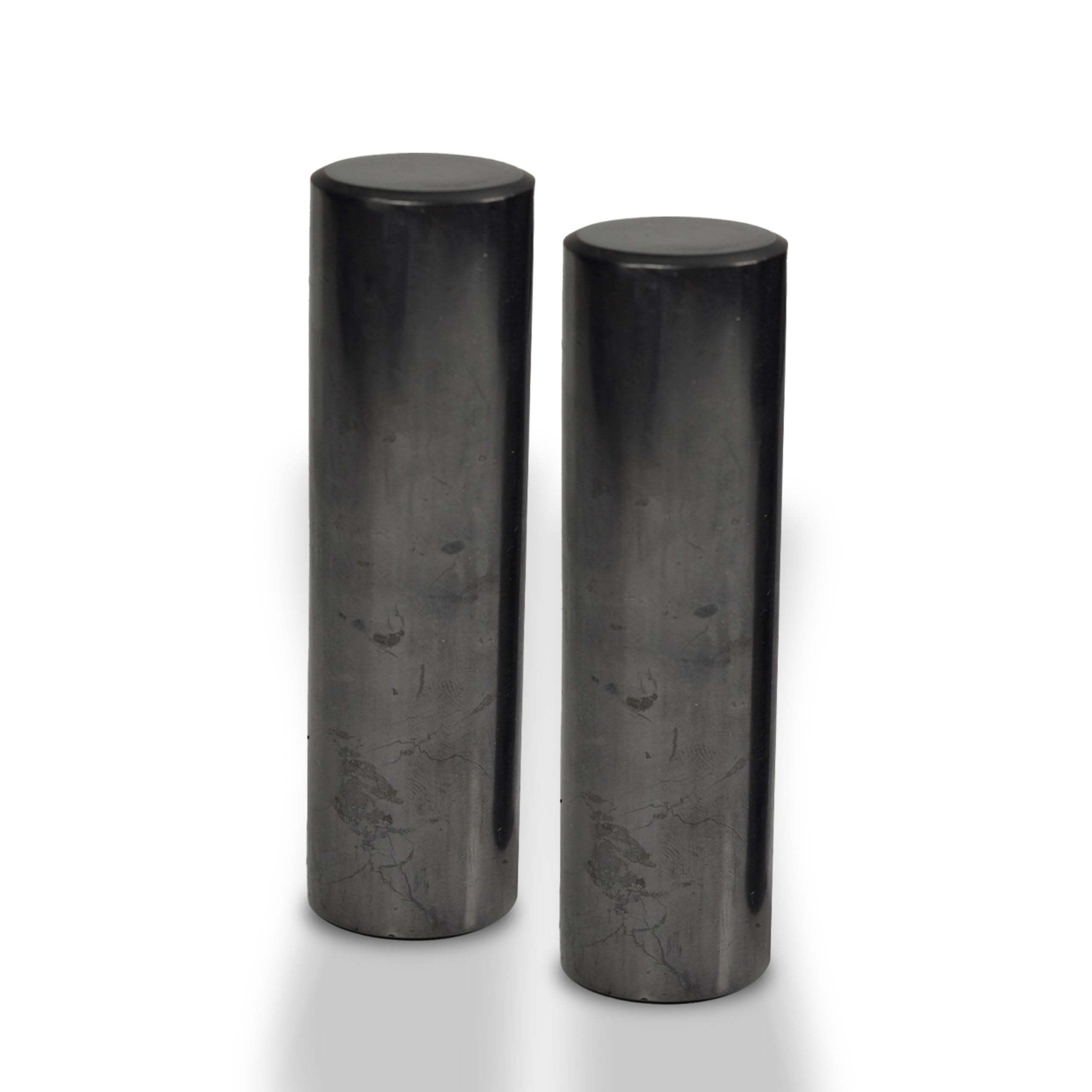 Shungite World two polished cylinders for grounding during meditation.