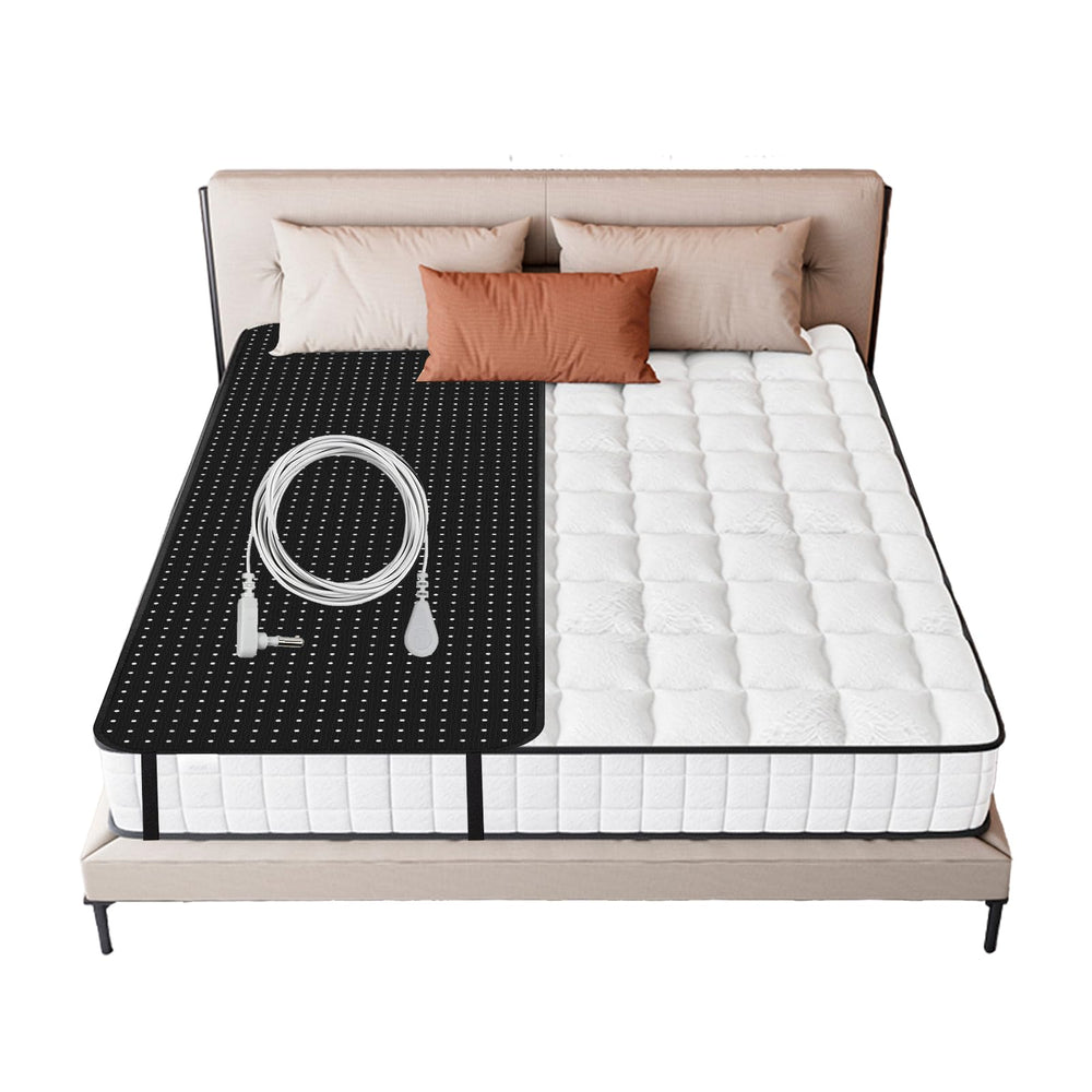 SHUOGVER grounding mat on a queen bed with brown faux leather finish for restful sleep
