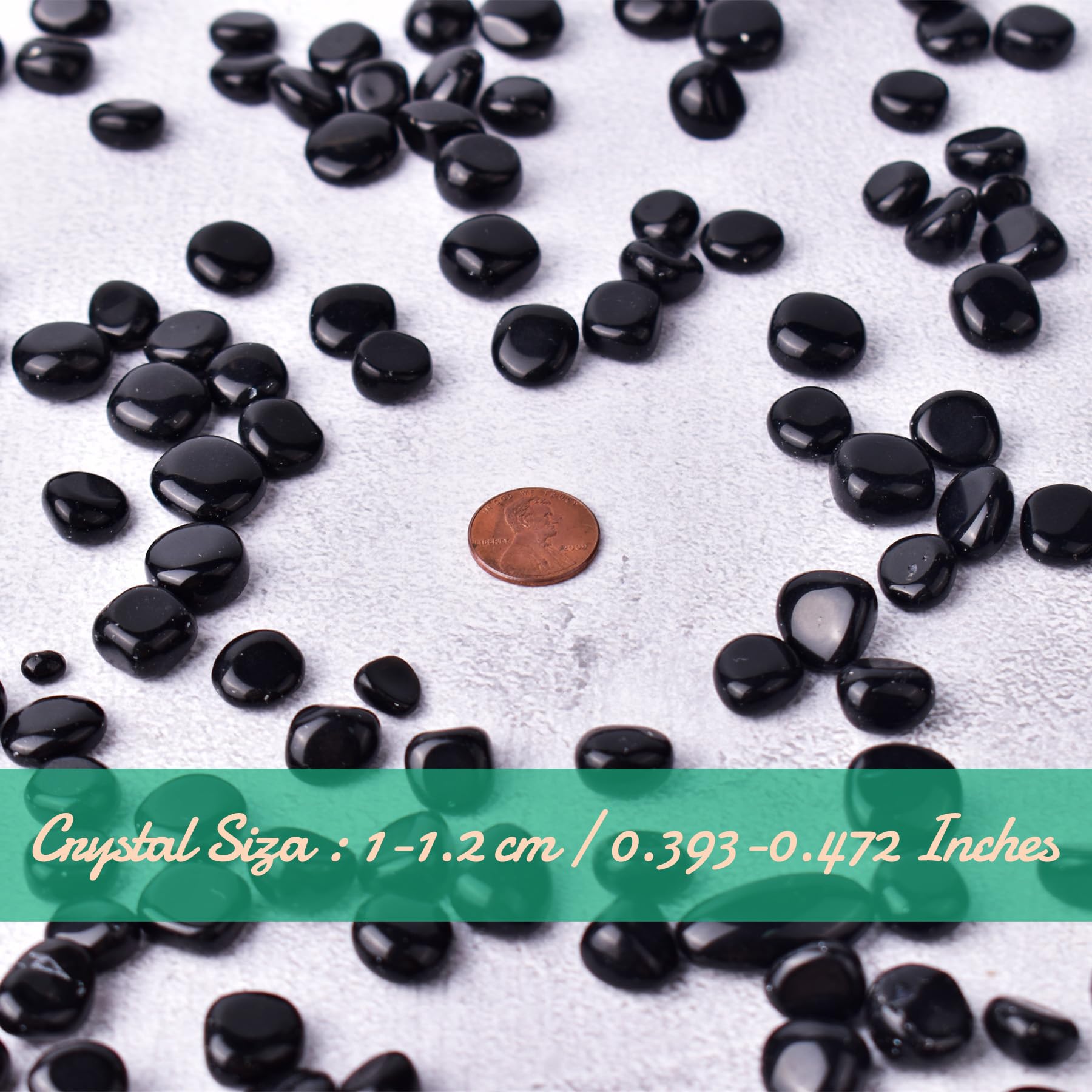 SigMntun obsidian crystal stones hand-held for tactile use and focus.