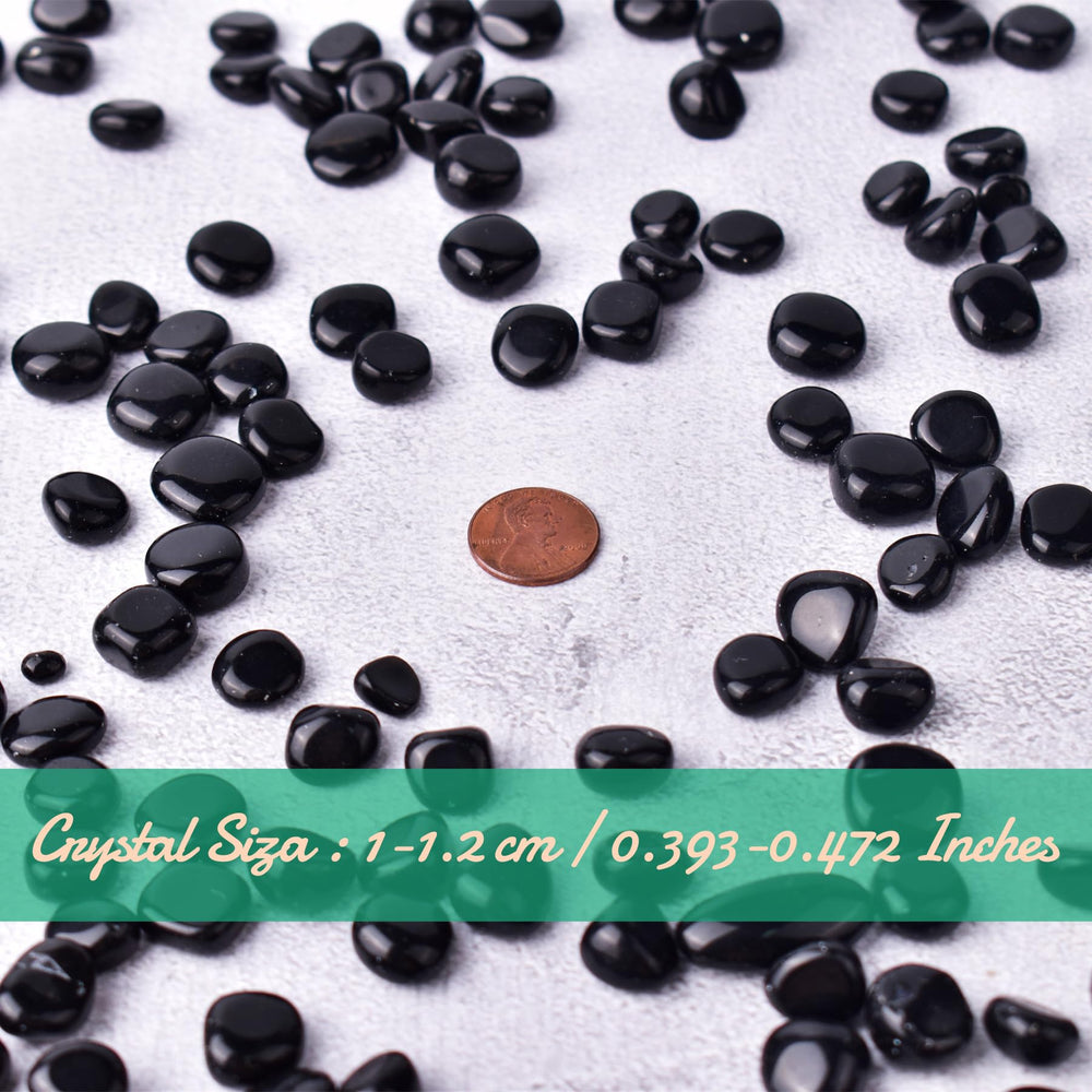 SigMntun obsidian crystal stones hand-held for tactile use and focus.