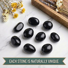 SigMntun obsidian worry stone with glossy finish highlighting natural patterns