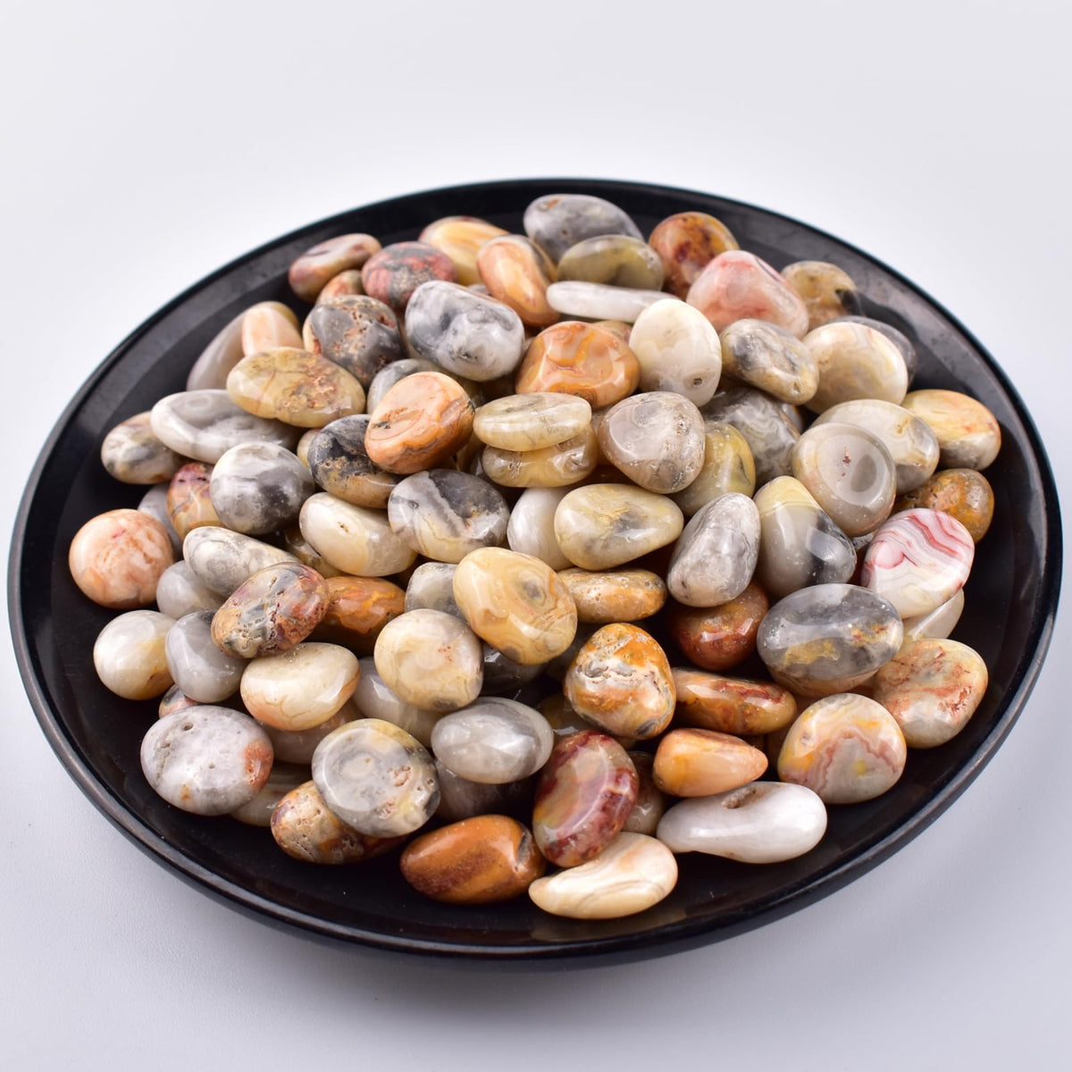 SigMntun polished crazy lace agate chips for meditation and energy balance.