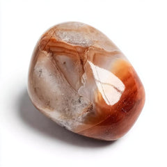 SigMntun polished Gobi agate worry stone in hand, smooth, calming tactile experience.