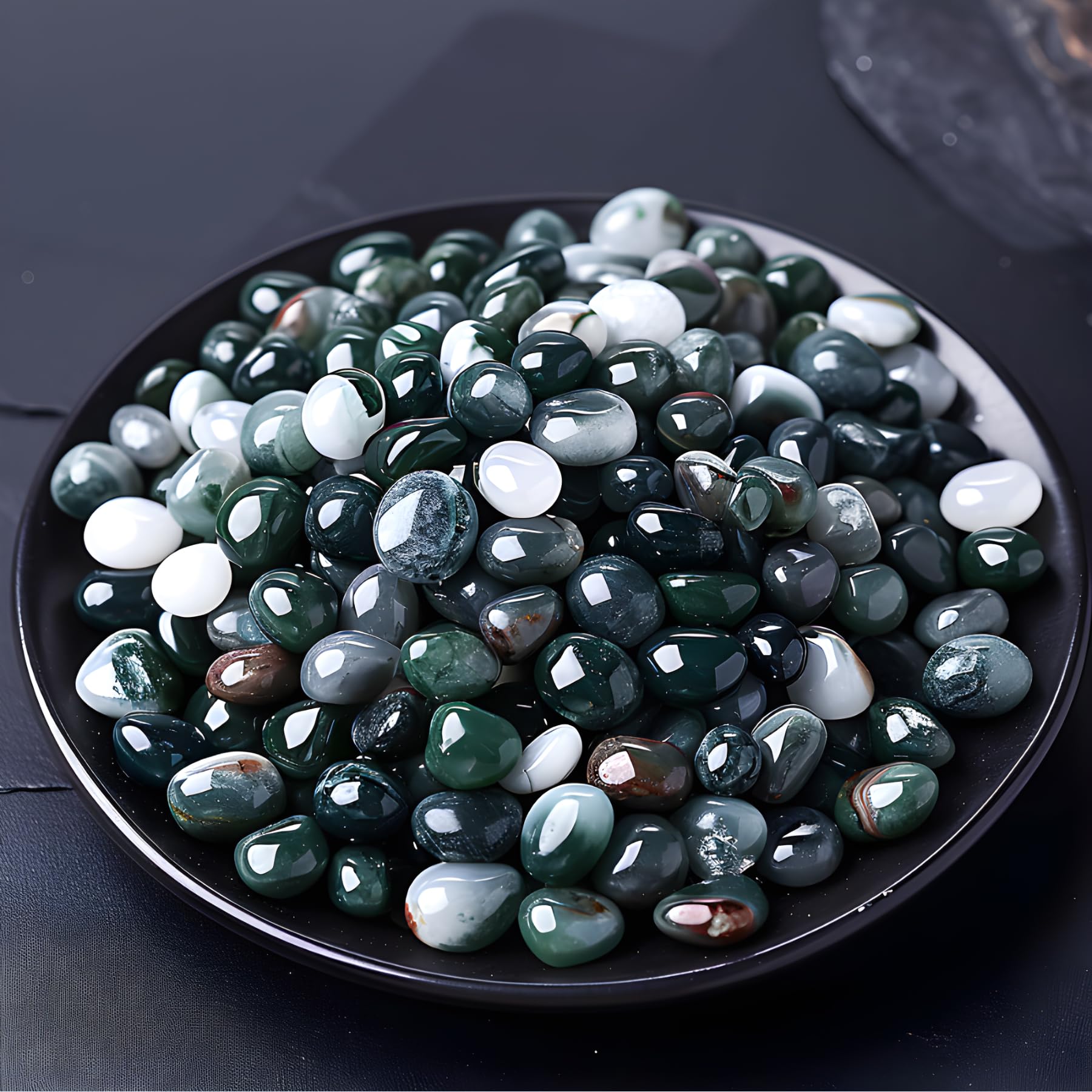SigMntun moss agate chips close-up, smooth polished surface for jewelry making.