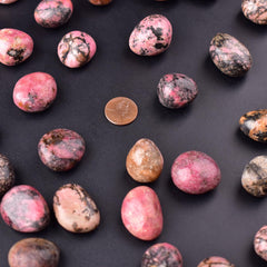 SigMntun Rhodonite crystals for Reiki and chakra-focused sessions.