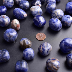 SigMntun sodalite polished stone pile shown as decorative display