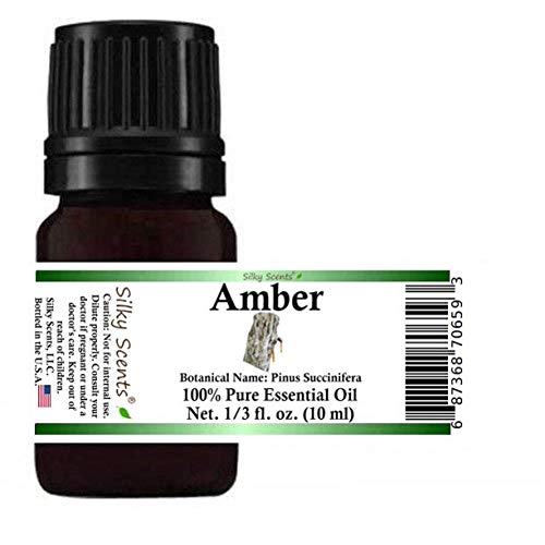 Silky Scents Amber Essential Oil bottle with amber glass preserving aroma.