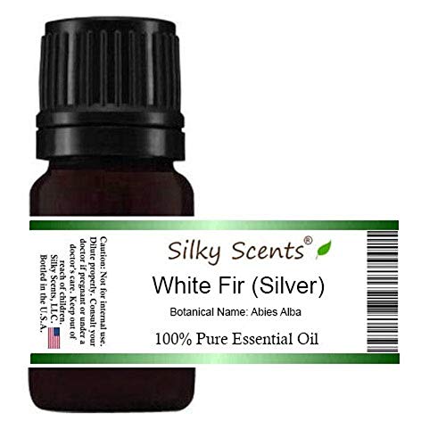 Silky Scents White Fir Essential Oil in amber bottle for aromatherapy and refreshing spaces.