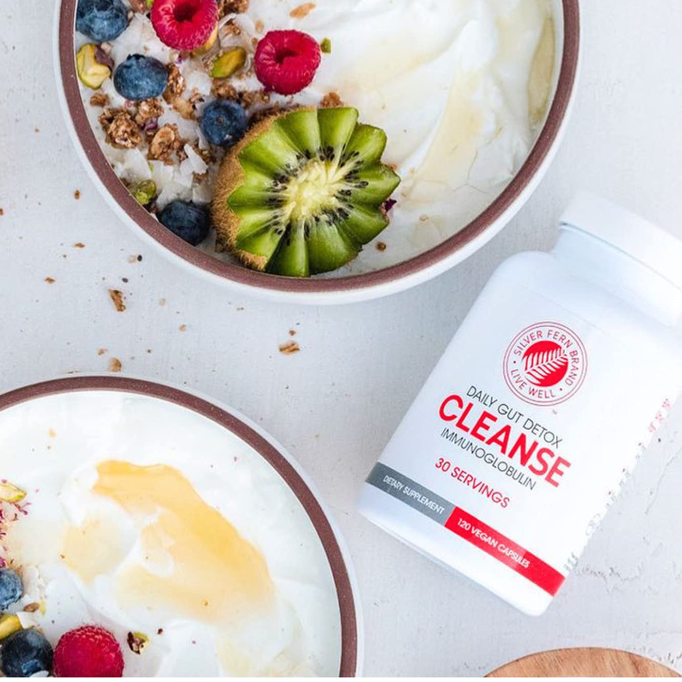 Silver Fern Cleanse capsules closeup showing IgG IgA IgM postbiotic blend