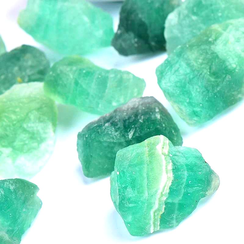 Simurg green fluorite rough close-up showing natural color zoning for lapidary projects.