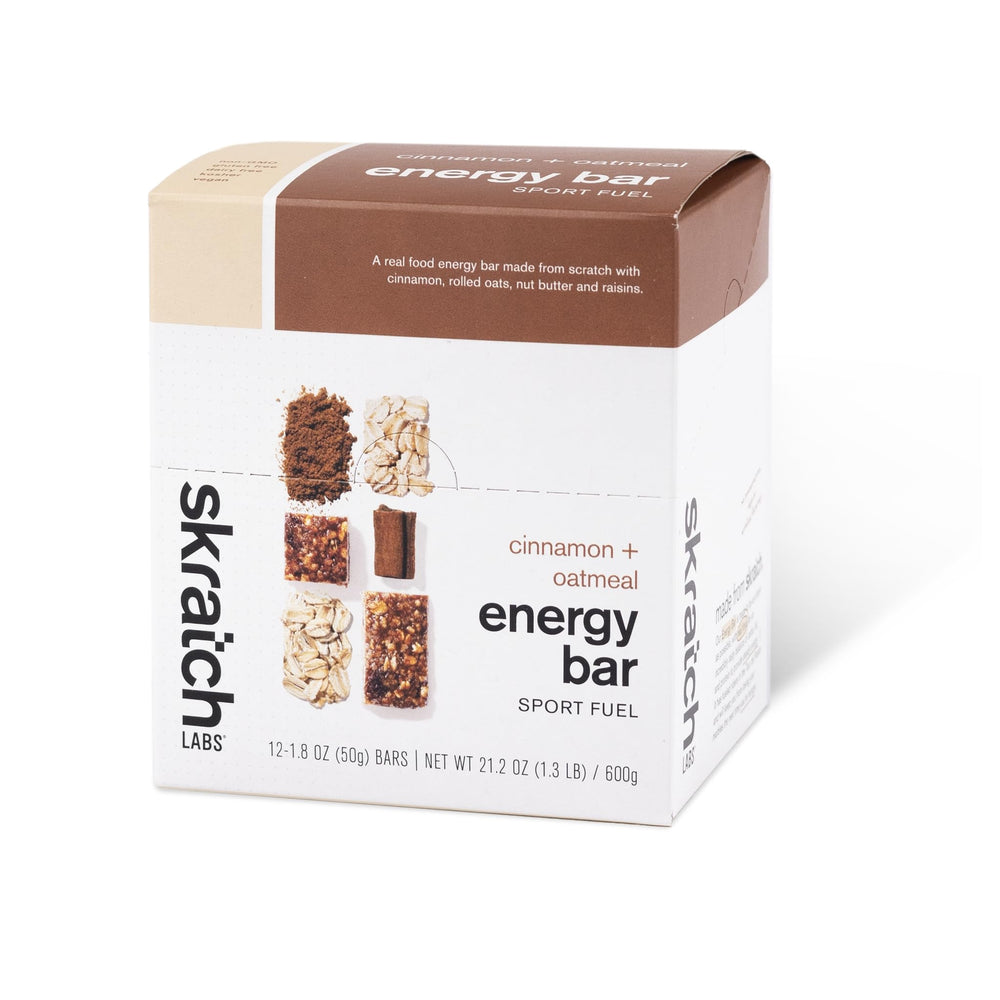 Skratch Labs Energy Bar Cinnamon Oatmeal packaging showcases clean plant-based fueling for workouts.
