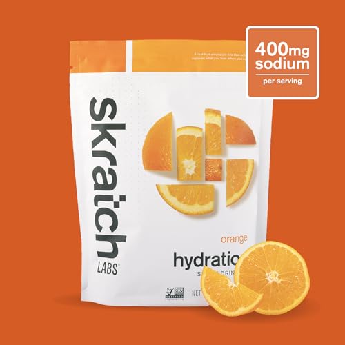 Skratch Labs Hydration Orange mixed glass showing refreshing citrus beverage