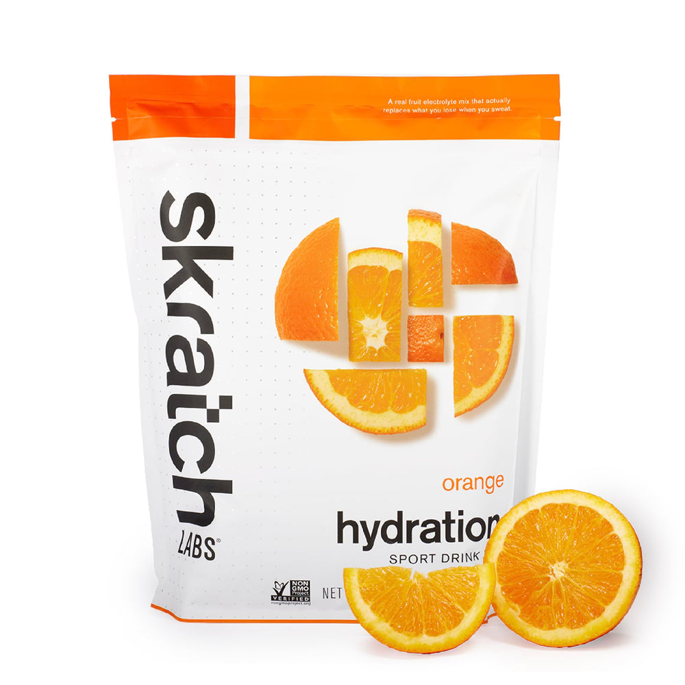 Skratch Labs Hydration Powder Orange packaging shows vegan and non-GMO credentials.