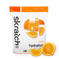 Skratch Labs Hydration Powder Orange packaging shows vegan and non-GMO credentials.