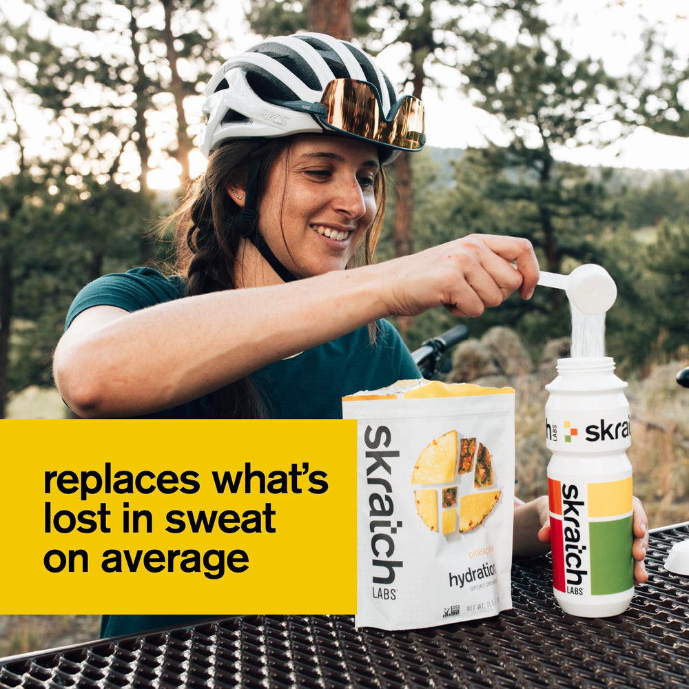 Skratch Labs Hydration Powder pineapple mixed into water during cycling.