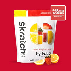 Skratch Labs Hydration Powder Strawberry Lemonade glass-mixed ready-to-drink hydration after workouts.