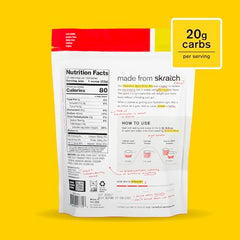 Skratch Labs Hydration Powder being poured into a glass for quick hydration.