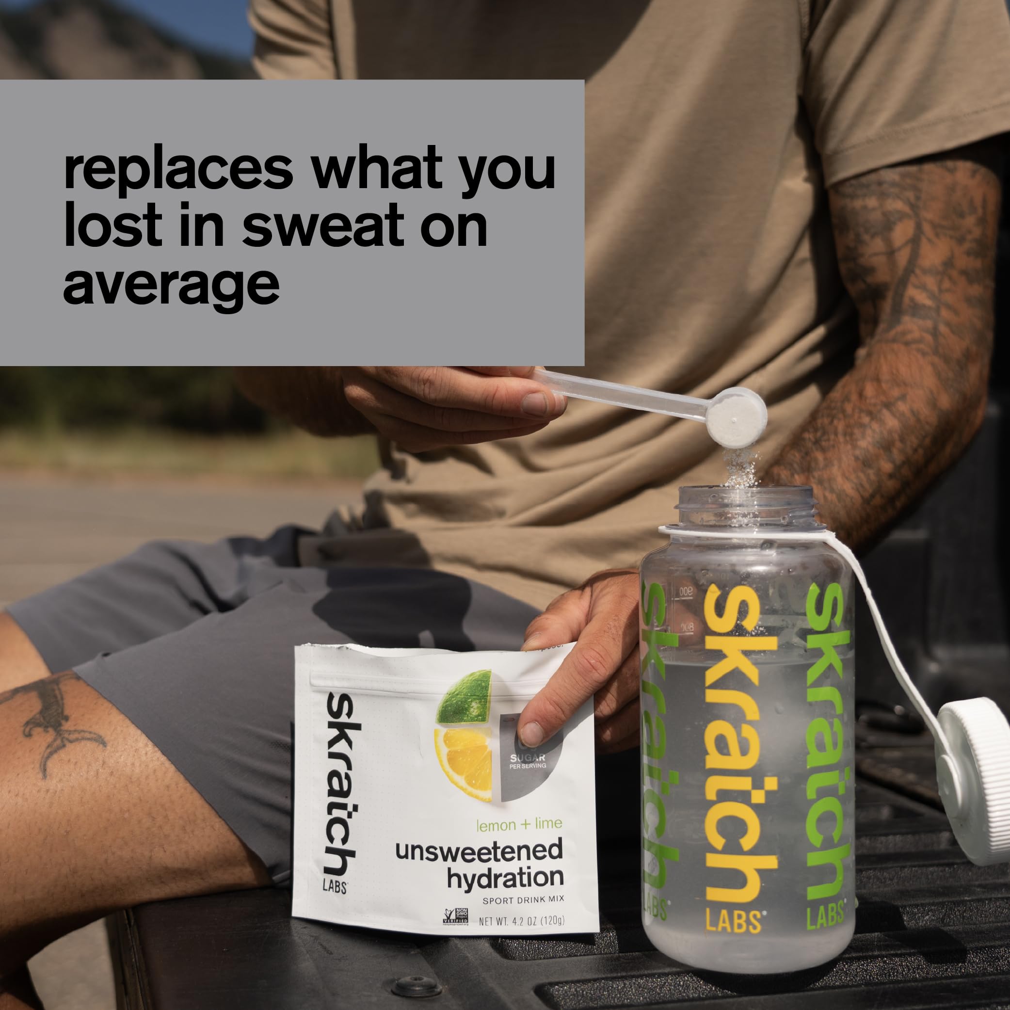Skratch Labs Unsweetened Hydration mix in a glass with ice suggests refreshing post-workout hydration