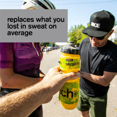 Skratch Labs unsweetened hydration travel pack on gym bag for on-the-go electrolytes.