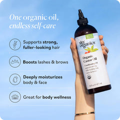 Applying Sky Organics Castor Oil to the scalp for nourishing routine.