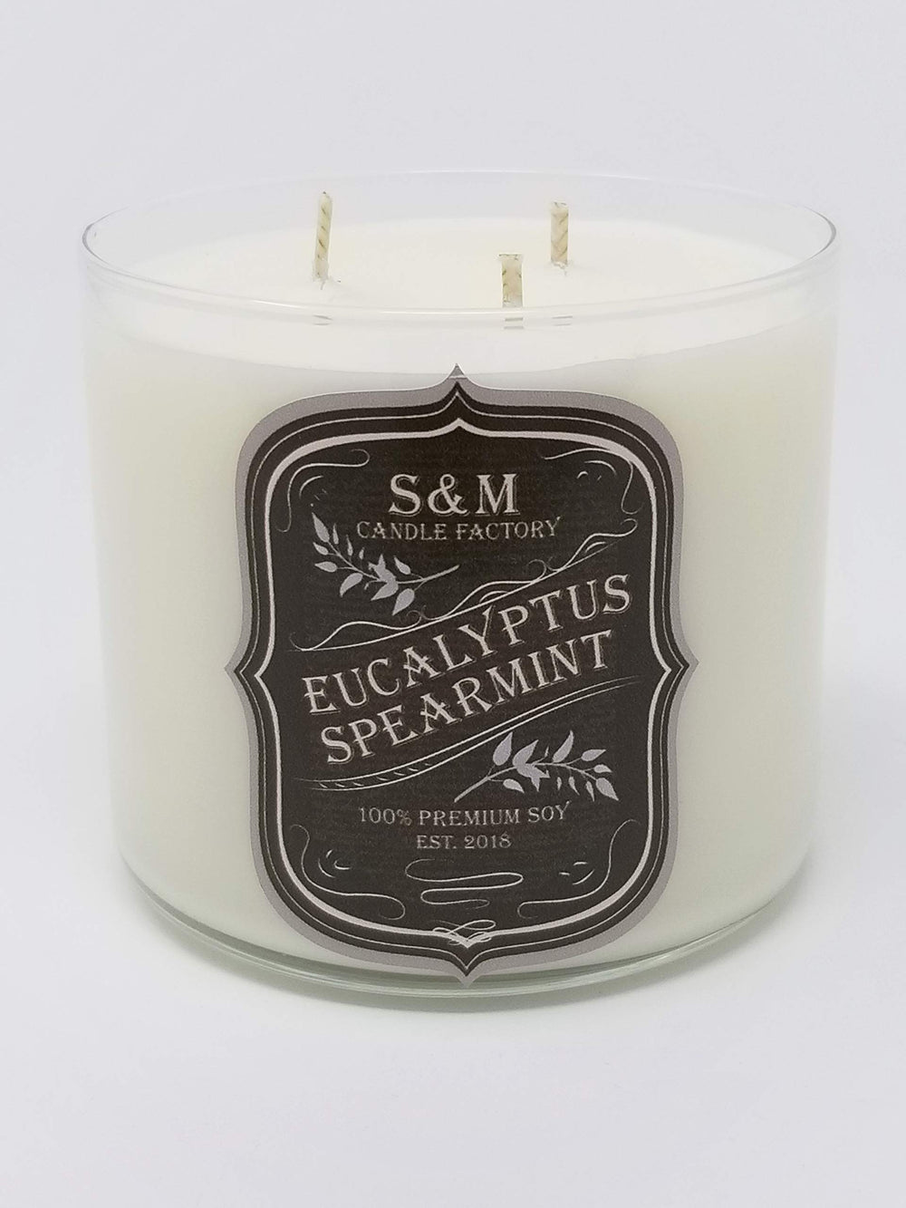 S&M Candle Factory eucalyptus spearmint 3-wick closeup highlighting strong fragrance for focused work.