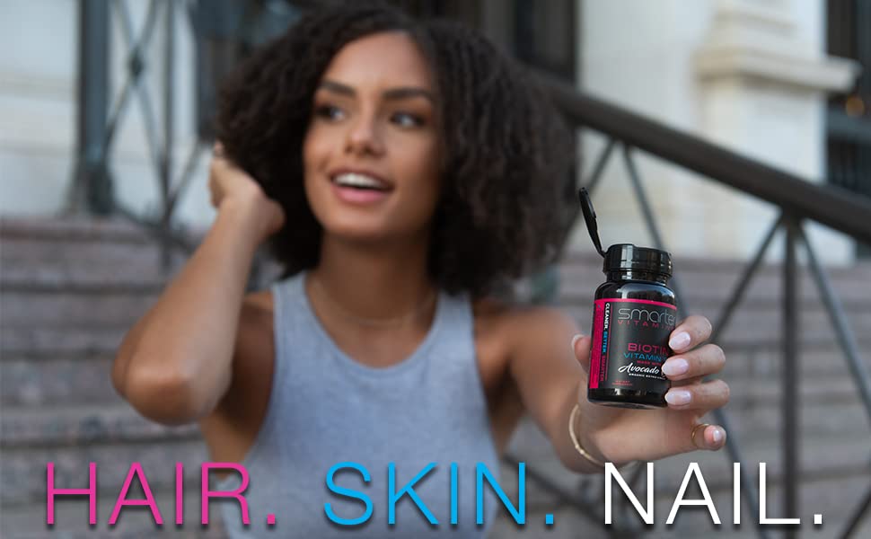 Label detail highlights 5000mcg Biotin and avocado oil content.