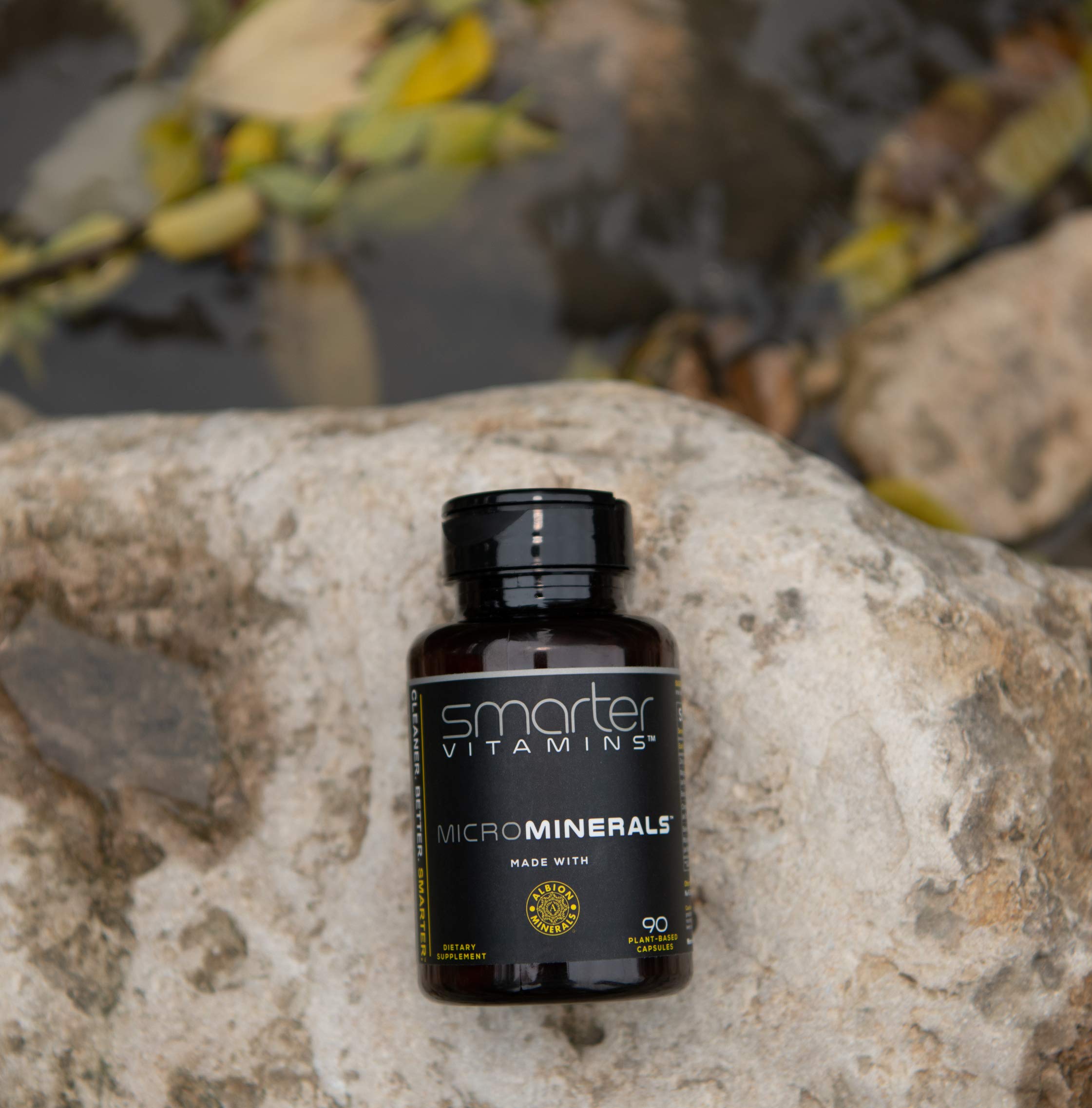 Vegan capsules and bottle shown for plant-based mineral supplementation.
