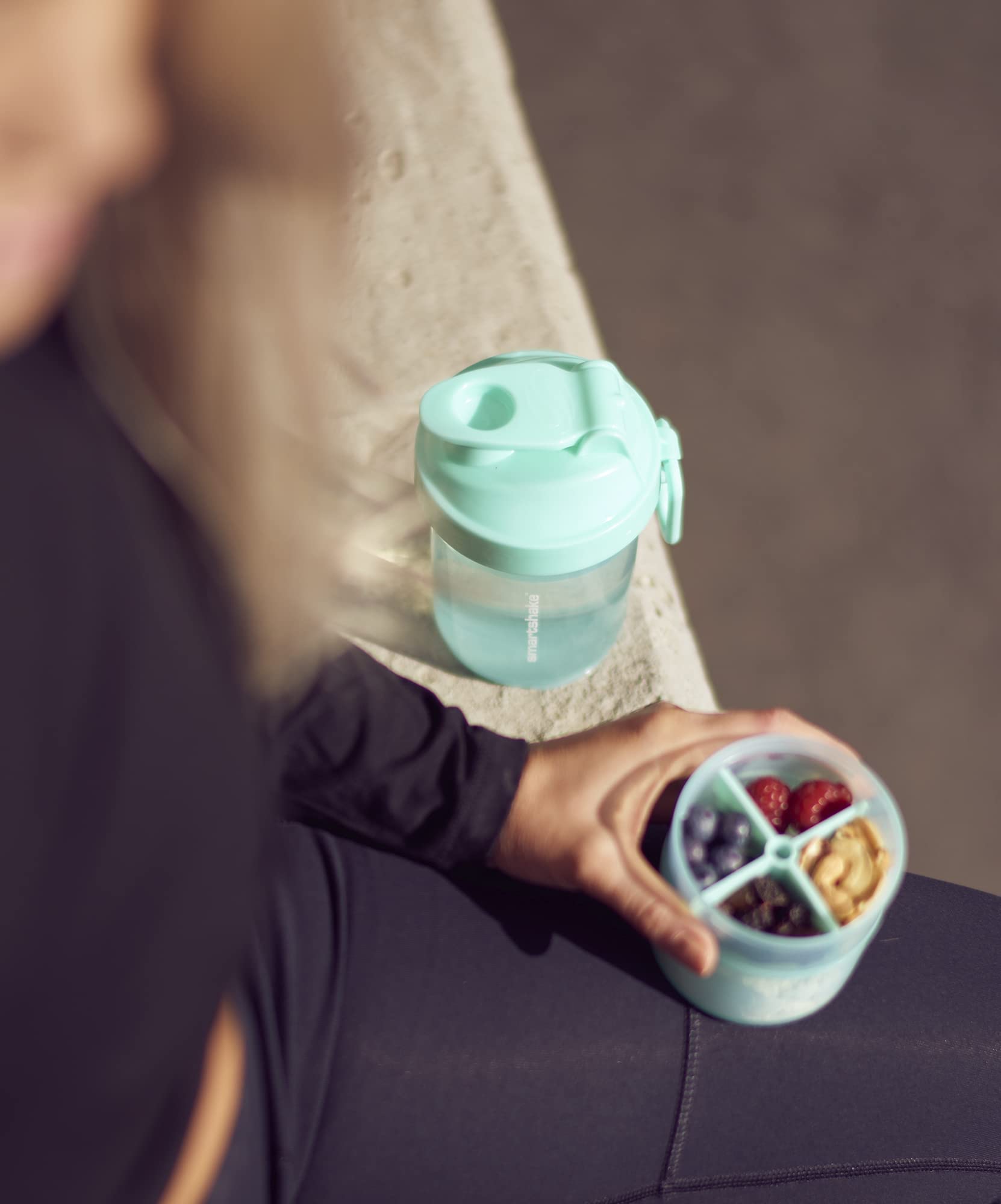 SmartShake Original 2GO clipped to bag for easy transport