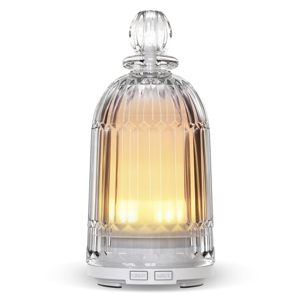 Smartwell glass diffuser with glass cover for elegant aroma diffusion at home.