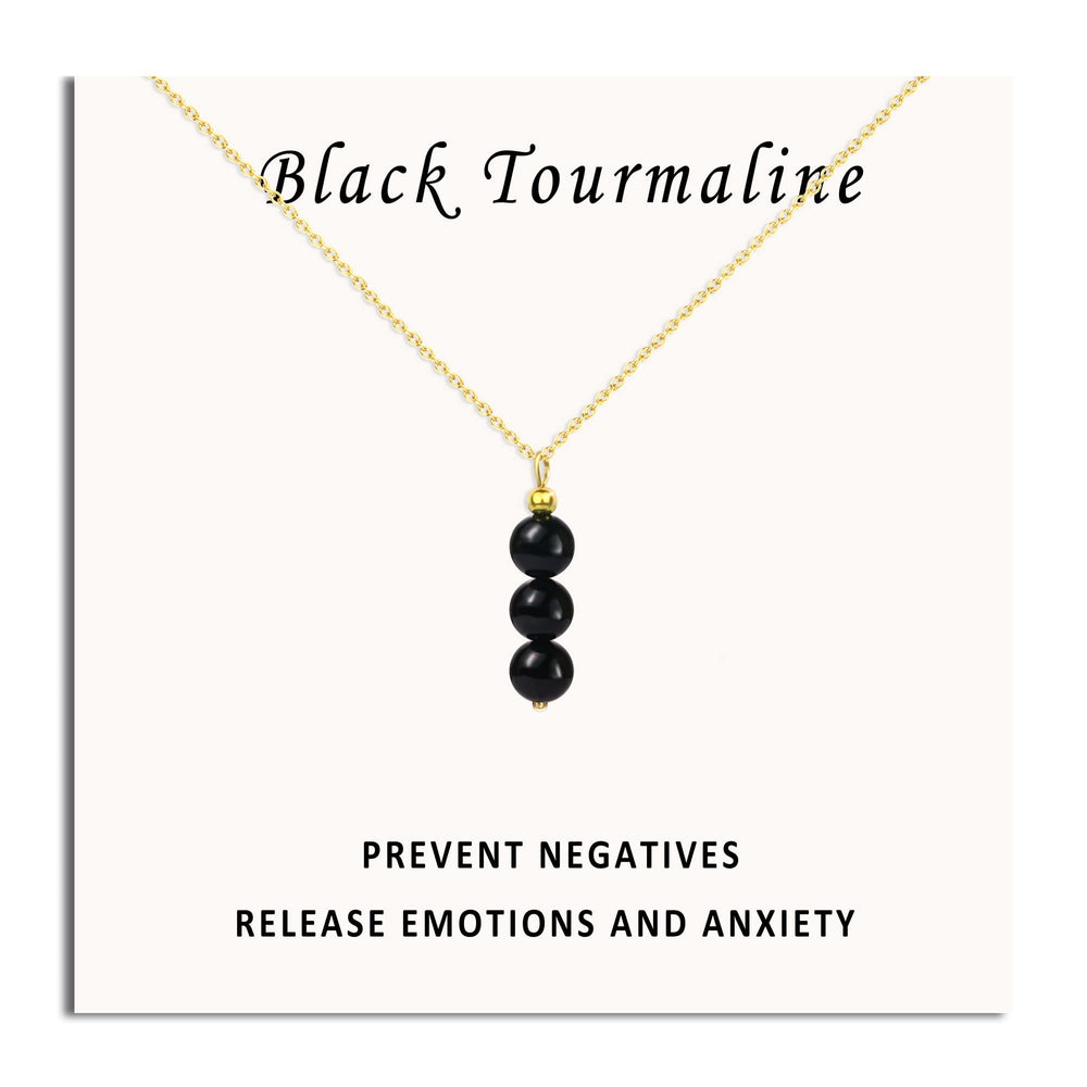 SmileBelle Black Tourmaline Necklace close-up bead shows natural color variation.