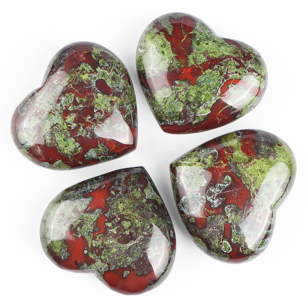 SMQ Dragon Blood Stone Heart Worry Stone artisan carving on display