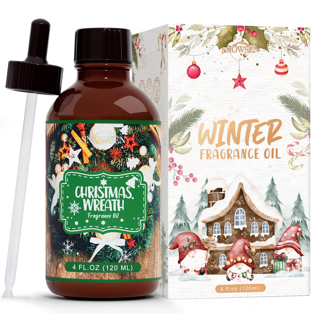 SNOWSEN Christmas Wreath fragrance oil in an amber bottle for long-lasting aroma.