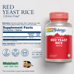 SOLARAY Red Yeast Rice capsules laid out for a daily routine.