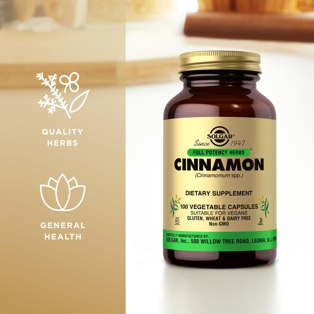 Solgar Cinnamon serving scoop beside capsules for easy measurement.