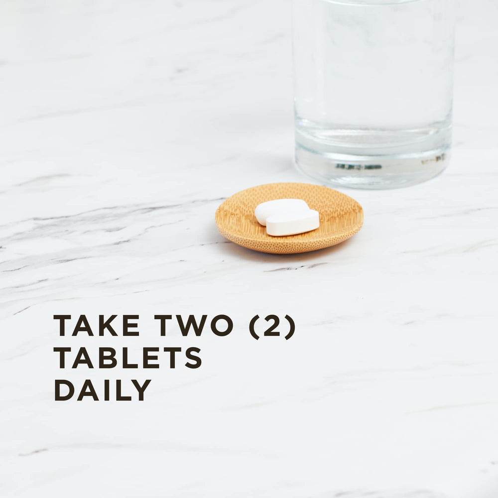 Solgar Magnesium Citrate 60 Tablets tablets on white surface ready for daily supplementation